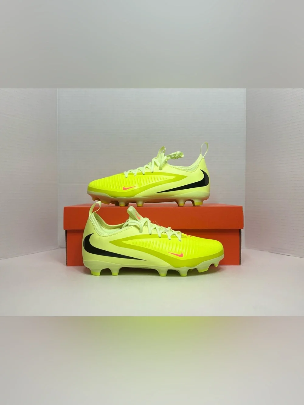 Nike Neon Yellow Soccer Cleats with Orange and Black Accents